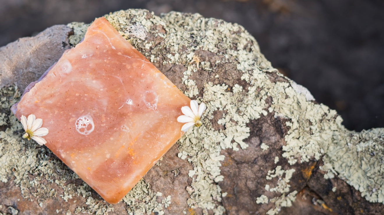 POG soap by Keālia with tropical fruit in background